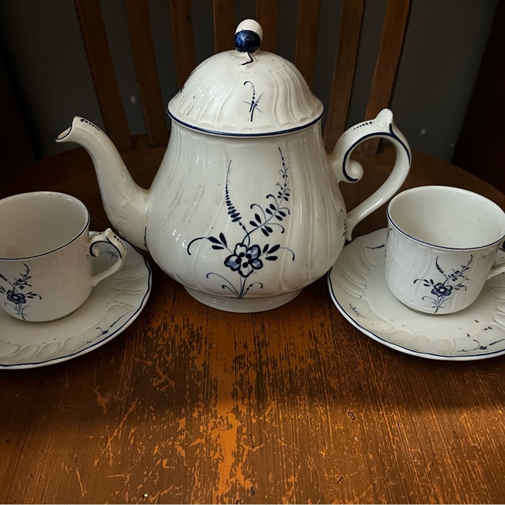 White Ceramic Teapot and Cup Set with Blue Floral Motif